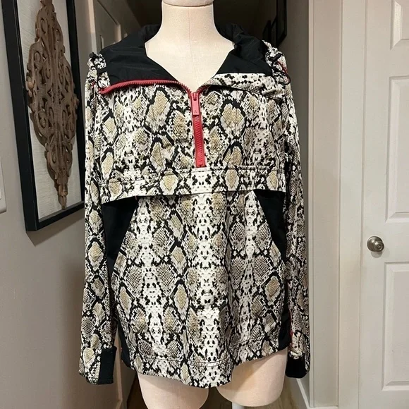 ALALA snakeskin anorak with red accents
